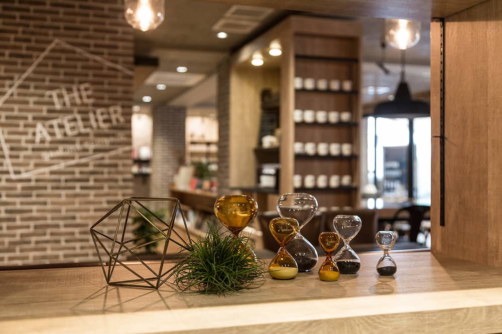 フロントのカウンターに置いてある砂時計のアクセサリー